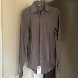 Very nice new with tags. Van Heusen dress shirt. Size XS. See details on tag.